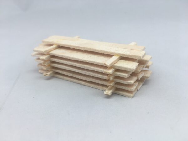 Miniature Lumber Pile measures 1 1/4 inches wide x 3 inches long & made in the USA with solid pine.