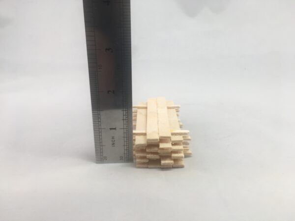 Miniature Lumber Pile measures 1 1/4 inches wide x 3 inches long & made in the USA with solid pine.