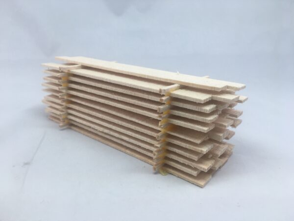 Miniature Lumber Pile measures 6 inches long x 2 inches high & made in the USA with solid pine.