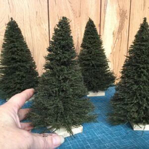 Miniature Trees 12 pack. Each is 7 Inch extra full miniature tree by 4 1/2 inch wide. MrTrain.com