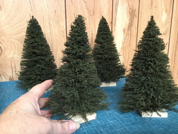 Miniature Trees 12 pack. Each is 7 Inch extra full miniature tree by 4 1/2 inch wide. MrTrain.com