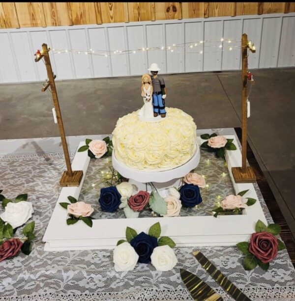Lineman Wedding Cake Decorated with 18" Poles. Customer photo for Inspirational Ideas.